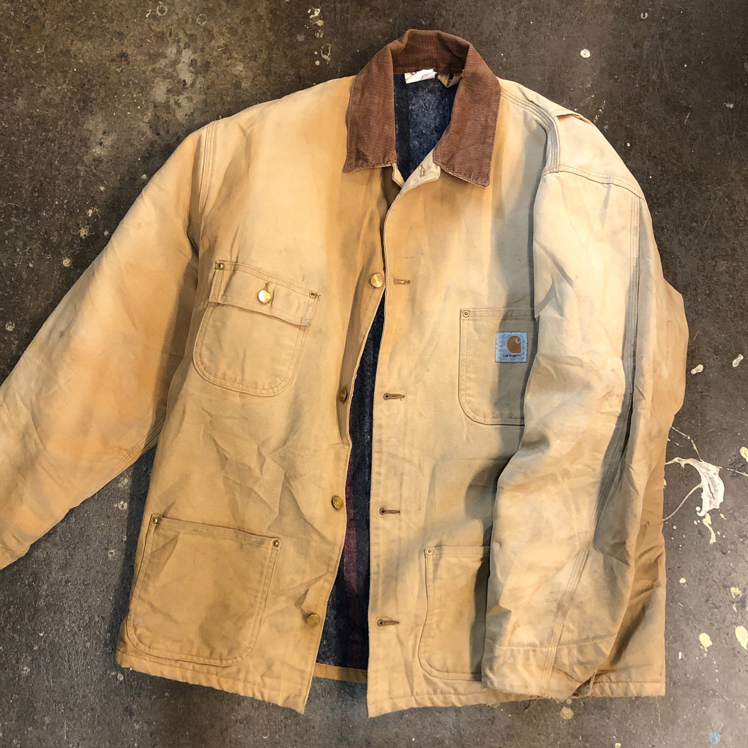 worn carhartt jacket